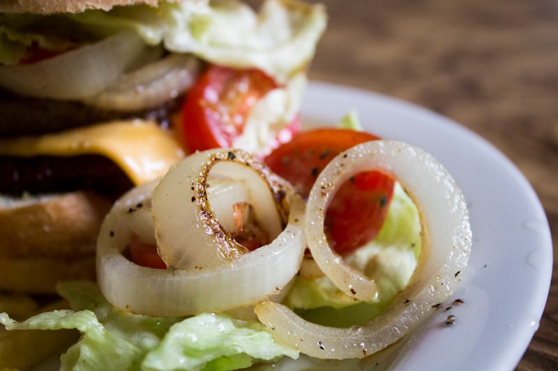 BBQ beef wrap with caramelized onions and cheese