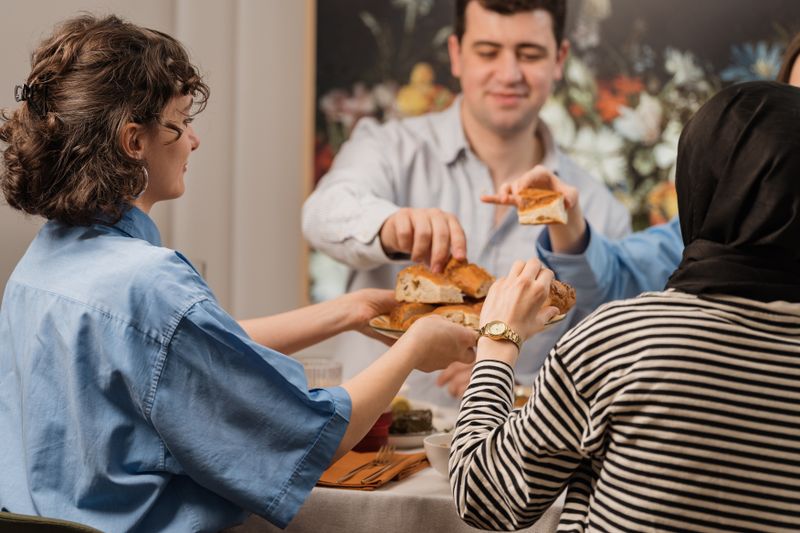 Community dinner event at Chopt restaurant with guests enjoying food