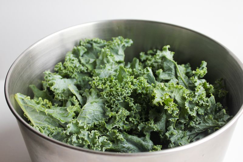 Harvest kale salad with roasted vegetables and nuts