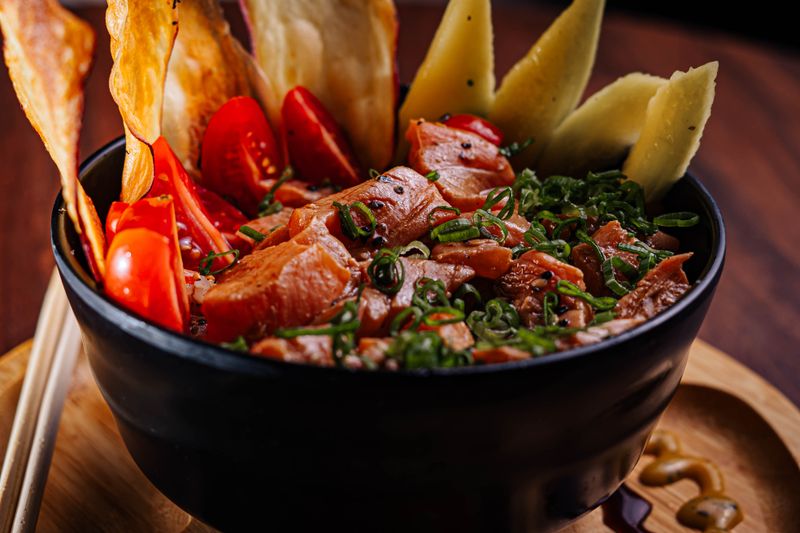 Farro grain bowl with salmon and seasonal greens
